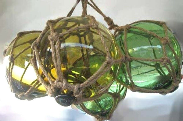 4 bolas de pesca en una red - verde y ámbar (marrón) 12,5 cm