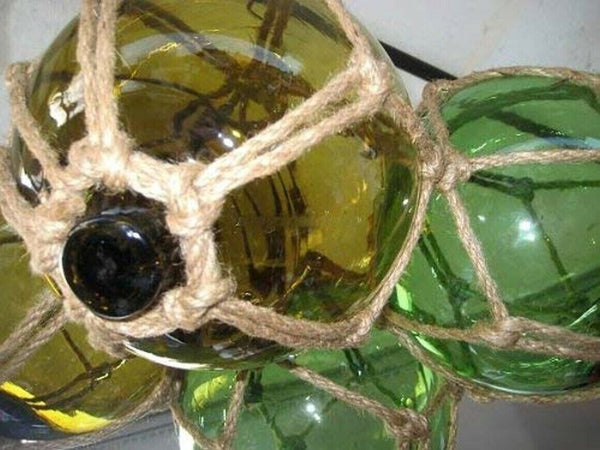 4 bolas de pesca en una red - verde y ámbar (marrón) 12,5 cm