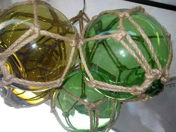 4 bolas de pesca en una red - verde y ámbar (marrón) 12,5 cm