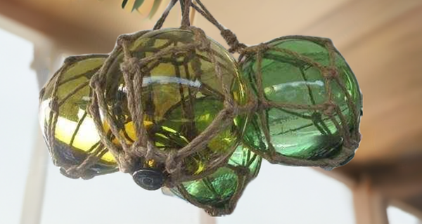 4 bolas de pesca en una red - verde y ámbar (marrón) 17,5 cm 