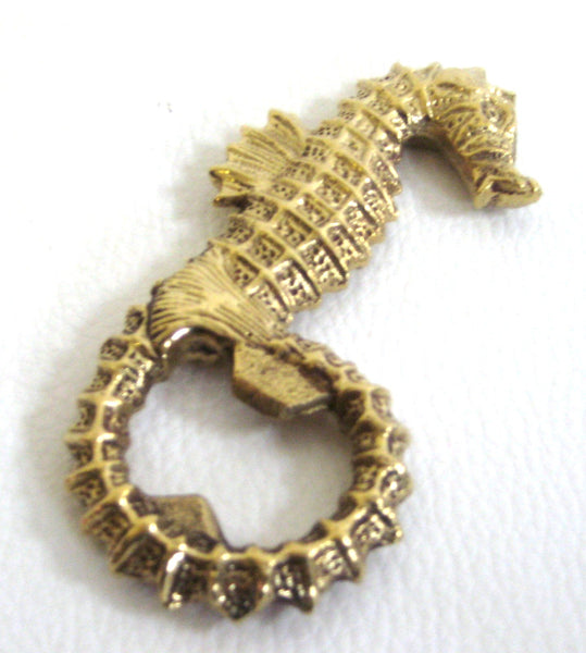 Destapador de botellas de latón macizo con diseño antiguo de caballito de mar.