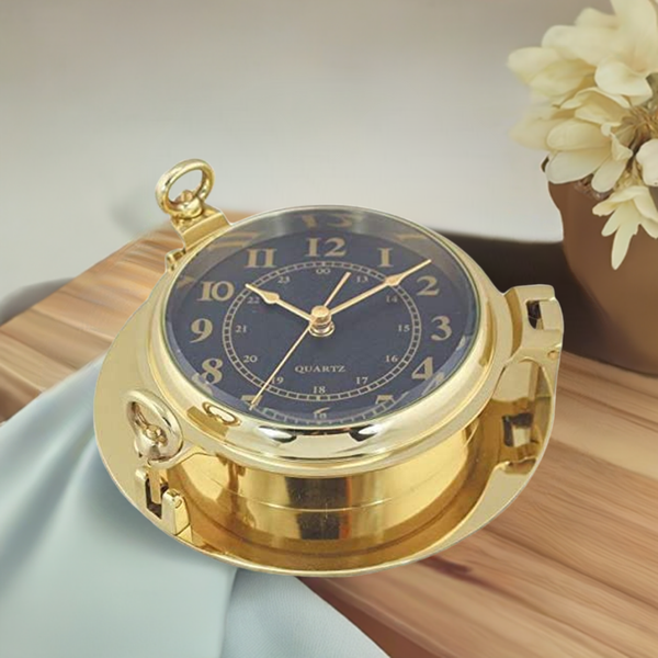 Reloj en forma de ojo de buey - latón, diámetro 22,5 cm - esfera negra 