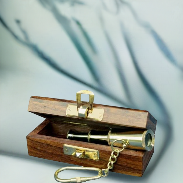 2 llaveros telescópicos en caja decorativa de madera. 