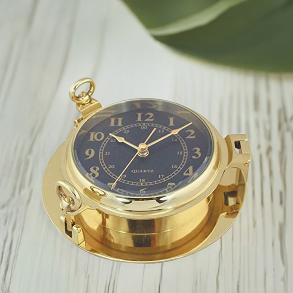 Reloj en forma de ojo de buey - latón, diámetro 22,5 cm - esfera negra 