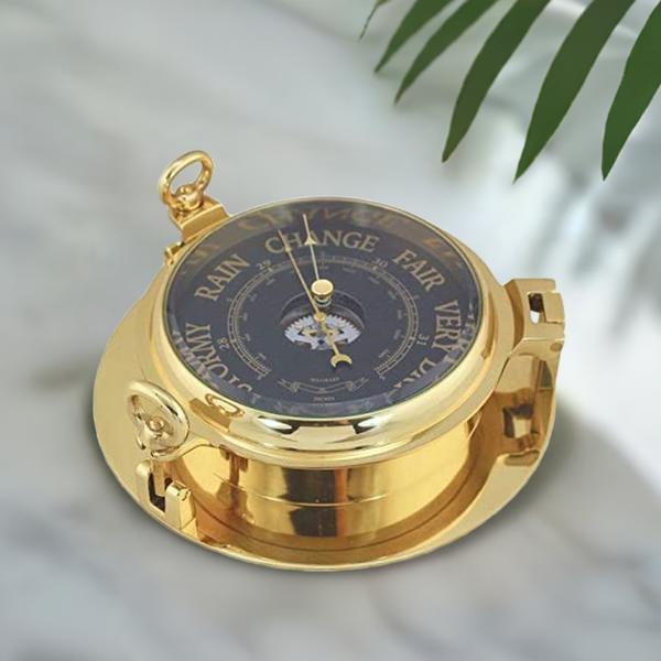 Barómetro en forma de ojo de buey - latón, diámetro 22,5 cm - esfera negra 