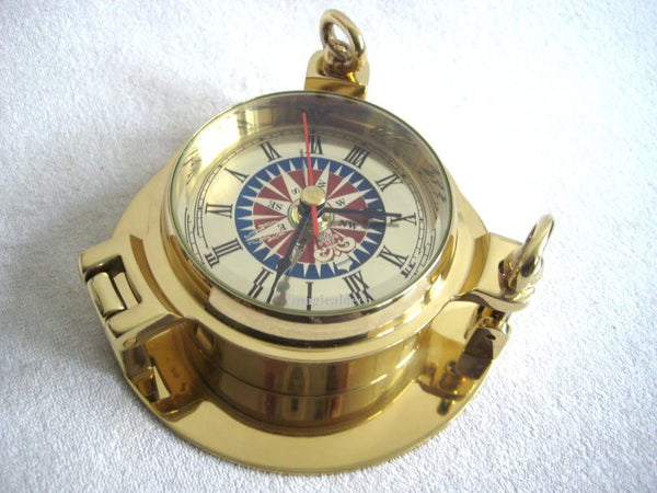 Reloj macizo en forma de ojo de buey - latón - diámetro 14 cm - náutico 