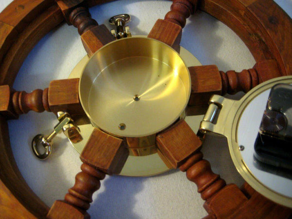 Reloj en ojo de buey 18 cm - volante - madera/latón total 60 cm 