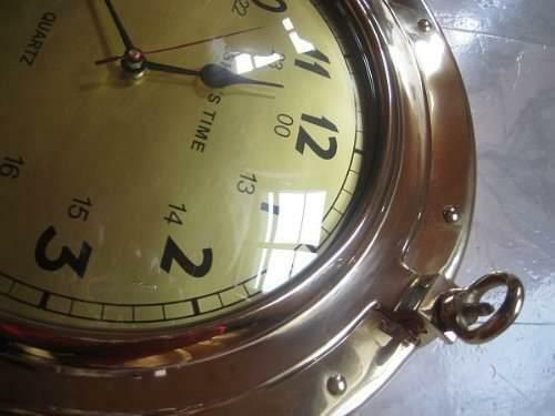 Reloj macizo en forma de ojo de buey - latón - diámetro 29 cm