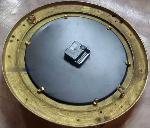 Reloj macizo en forma de ojo de buey - latón - diámetro 29 cm