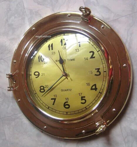 Reloj macizo en forma de ojo de buey - latón - diámetro 29 cm